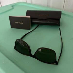 Sunglasses by Oliver Peoples.